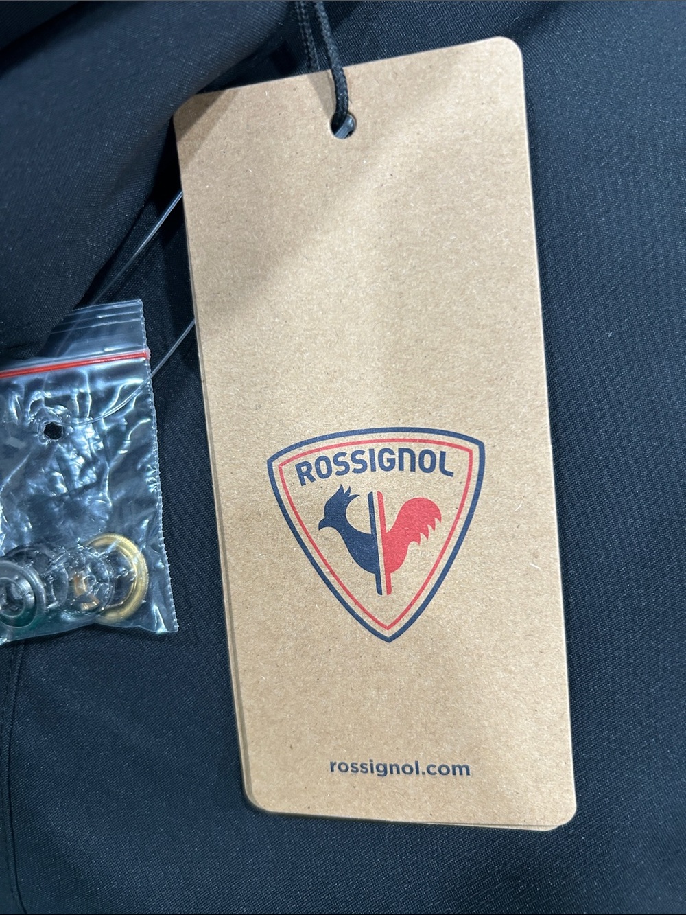 Rossignol Brown Tag with Black and Red Logo
